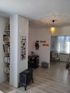 Posedenie v ubytovaní maison spacieuse et lumineuse+ studio