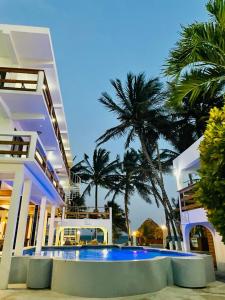 a large house with a swimming pool in front of it at Corona del Mar in San Pedro