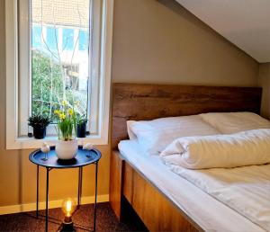 Un pat sau paturi într-o cameră la #26 Sokndal