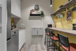 Kuchyň nebo kuchyňský kout v ubytování NN Urban Guesthouse