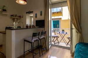 TV a/nebo společenská místnost v ubytování casa dei gemelli