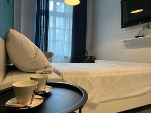 Ένα ή περισσότερα κρεβάτια σε δωμάτιο στο Apartament Zielony