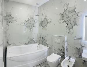 Koupelna v ubytování UJVARA HOTEL