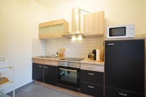 Kuchyň nebo kuchyňský kout v ubytování Dein Flughafen Messe Apartment nahe Düsseldorf 2