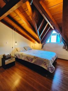 A bed or beds in a room at Barbati balcony view