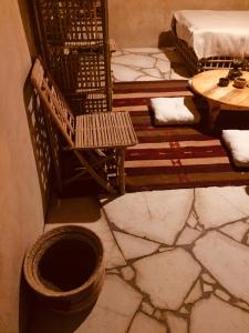 an overhead view of a room with a table and chairs at Tanirt ecolodge in Siwa