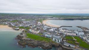 an aerial view of a city and a beach at 1 Island View in Portrush