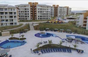 an aerial view of a resort with two pools at Ilhas do Lago Eco Resort in Caldas Novas +7 photos