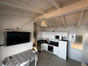 A kitchen or kitchenette at La dolce vita , fronte mare