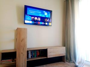 A television and/or entertainment centre at House 4-you