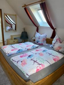 Postel nebo postele na pokoji v ubytování Ostsee Appartement Grömitz - Haus Ihlow