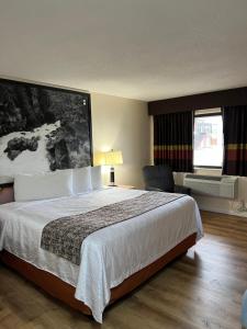 Postel nebo postele na pokoji v ubytování Scottish Inns Ashland