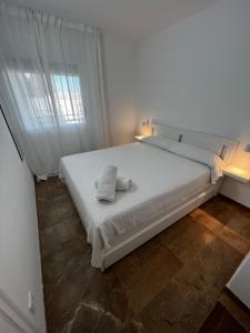 Postel nebo postele na pokoji v ubytování Apartamento a 3 minutos de la playa