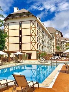 Bazén v ubytování Flat Hotel Pedra Azul nebo v jeho okolí