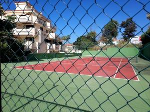Tenis a/nebo squash v ubytování apto súper luminoso nebo okolí
