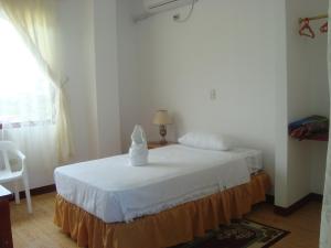 Voodi või voodid majutusasutuse Hotel Sula Sula toas