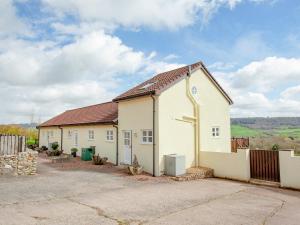 a white house with a red roof at Stargazer - Uk43267 in Luppitt