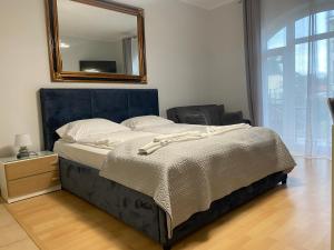 Postel nebo postele na pokoji v ubytování Apartament Comfort w Świnoujściu