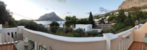 a balcony with a view of a mountain at Myrties Boutique Aparments in Myrties