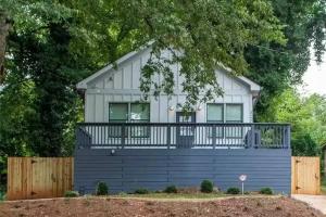 a small house with a large deck at West End Modern Atlanta 3 Bedroom Bungalow in Atlanta
