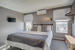 Voodi või voodid majutusasutuse Auberge des Cantons toas