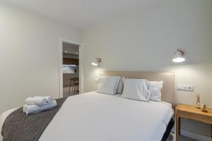 Posteľ alebo postele v izbe v ubytovaní Apartamento El Peñón