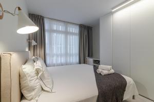 Posteľ alebo postele v izbe v ubytovaní Apartamento El Peñón