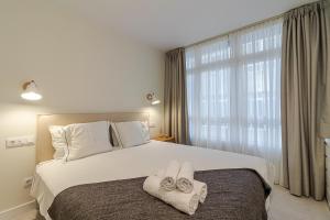Posteľ alebo postele v izbe v ubytovaní Apartamento El Peñón