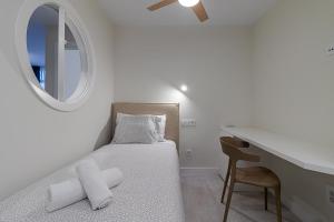 Posteľ alebo postele v izbe v ubytovaní Apartamento El Peñón