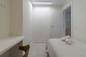 Posteľ alebo postele v izbe v ubytovaní Apartamento El Peñón