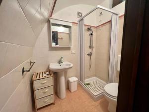 a bathroom with a sink and a shower and a toilet at The love barrel, lovely one bedroom in Parabita in Parabita +23 photos