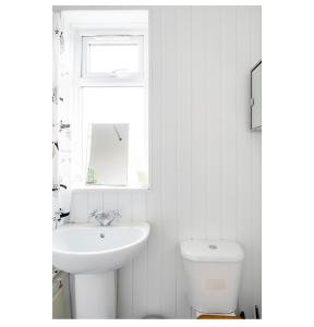 a white bathroom with a sink and a toilet at Private Double Room in London in Streatham Vale