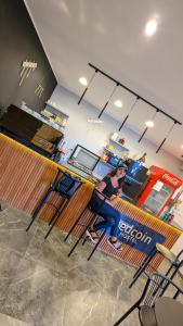 A restaurant or other place to eat at Bedcoin Hostel