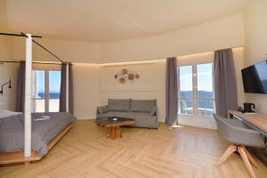 Televiisor ja/või meelelahutuskeskus majutusasutuses Hotel Hermes