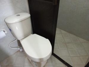 Koupelna v ubytování Apartamentos con estacionamiento cerca al parque