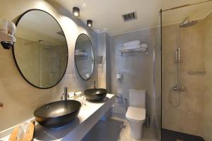Vannituba majutusasutuses Hotel Hermes
