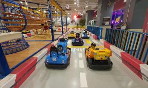 a group of toy cars in a toy garage at Silla Boutique Hotel Premium in Gyeongju