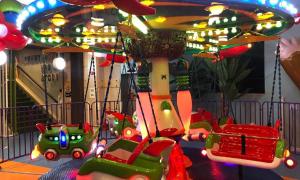 a merry go round at a childrens amusement park at Silla Boutique Hotel Premium in Gyeongju