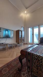 TV a/nebo společenská místnost v ubytování TM 16 Padang, Near Mentawai Fast & City Center