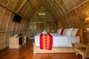 En TV eller et underholdningssystem på Daghan Cottage Nusa Penida