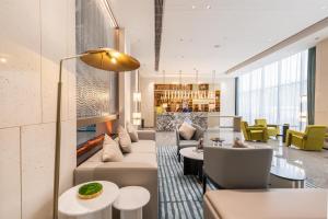 Guangzhou Baiyun Airport MeHood Liz Hotel Free Shuttle Bus To Airport的休息区