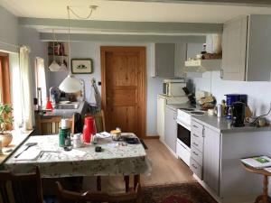 Kuchyň nebo kuchyňský kout v ubytování Holiday home Erslev