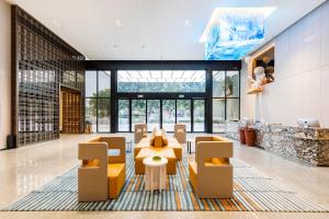 Guangzhou Baiyun Airport MeHood Liz Hotel Free Shuttle Bus To Airport的休息区