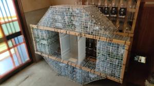 un edificio realizzato con piastrelle a mosaico blu di Gegege no Guesthouse - Vacation STAY 9460 a Uozu