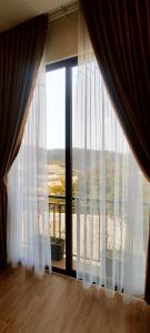 Balkón nebo terasa v ubytování GREENECO DA LAT HOTEL - Khách sạn Green Eco Đà Lạt