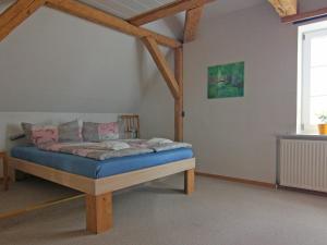 Katil atau katil-katil dalam bilik di Ferienwohnung im Gutshaus Schulenbrook