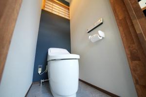 a bathroom with a toilet and a roll of toilet paper at ZENYA - Vacation STAY 89339v in Nakano