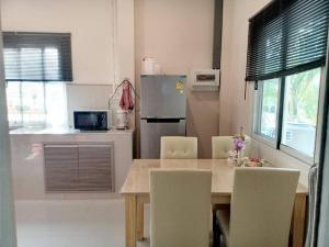 Køkken eller tekøkken på Kantry's House กัญญ์ทรี่ เฮ้าท์