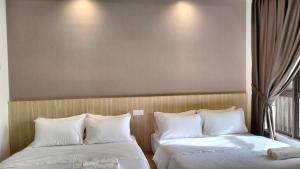 Ένα ή περισσότερα κρεβάτια σε δωμάτιο στο NEW Cozy Seaview Bali Residences Studio 4pax near Jonker +31 φωτογραφίες