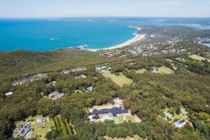 an aerial view of a house and the beach at Launa Killcare Heights in Killcare